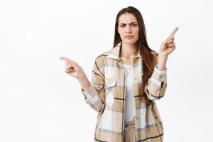 woman pointing to two choices