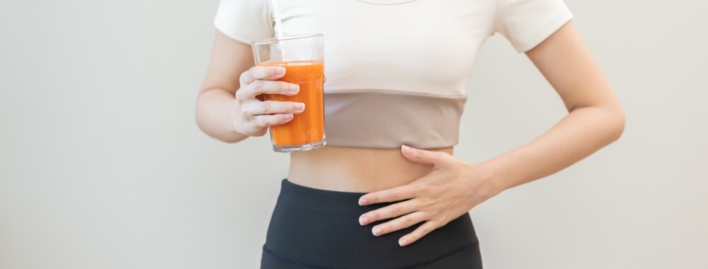 person measuring stomach